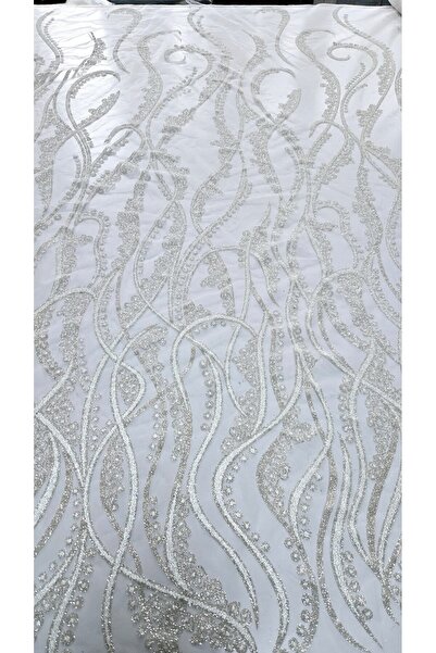 TESATURI OUTLET Premium tulle accessorized with white beads and silver glitte...
