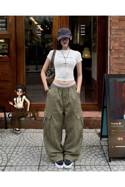Touz Ekstra široke zelene platnene tkanine, unisex pantalone sa velikim džepo...