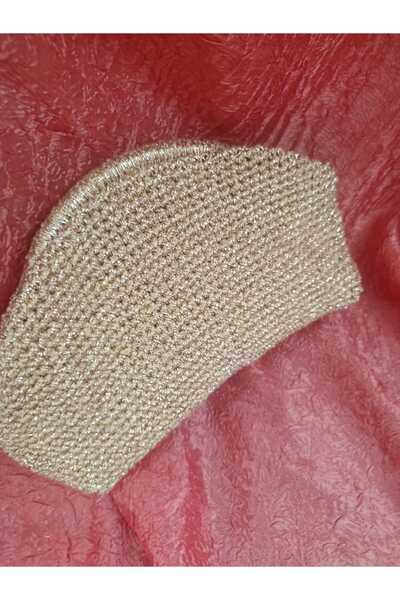 hobilanka χρυσό τσαντάκι κλατς " (gold clutch bag) or  "χρυσό τσαντάκι " (gol...