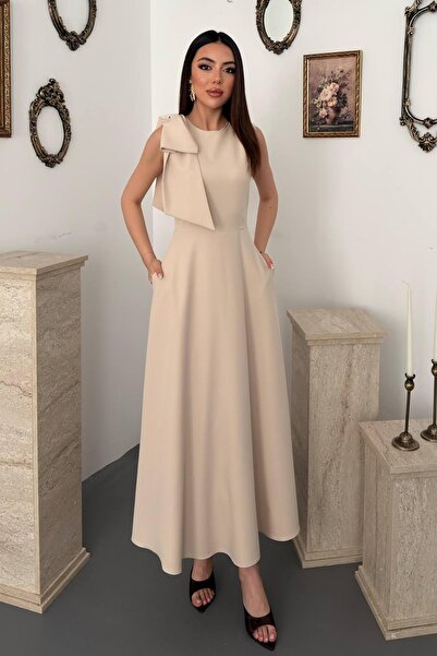 Clothes Fast فستان نسائي بيج بدون أكمام وياقة دائرية وجيوب على الكتف وحزام عل...