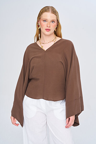 Orfeo Negro Women's Asymmetrical Cut V-Neck Solid Color Flowy Blouse