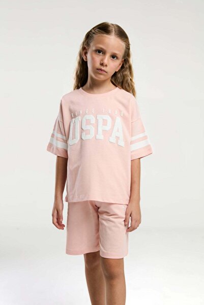 U.S. Polo Assn. بدلة برمودا للفتيات من يو إس بولو أسن بأكمام قصيرة وطباعة نصي...