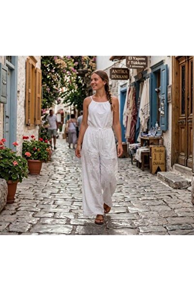 Gülümse boutique بنطلون نسائي أبيض بتفاصيل مطرزة واسعة الساق/واسعة الأرجل، 10...