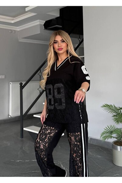 Bella Belluci طقم دانتيل برقبة على شكل حرف V