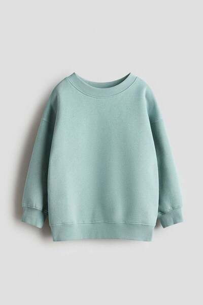 H&M بلوزة كبيرة الحجم برقبة دائرية