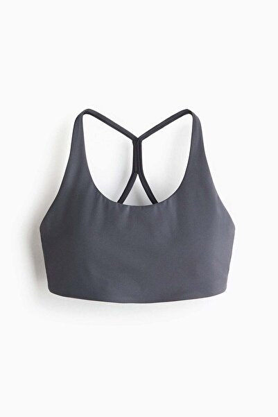 H&M حمالة صدر رياضية متوسطة الدعم بتقنية SculptMove™،