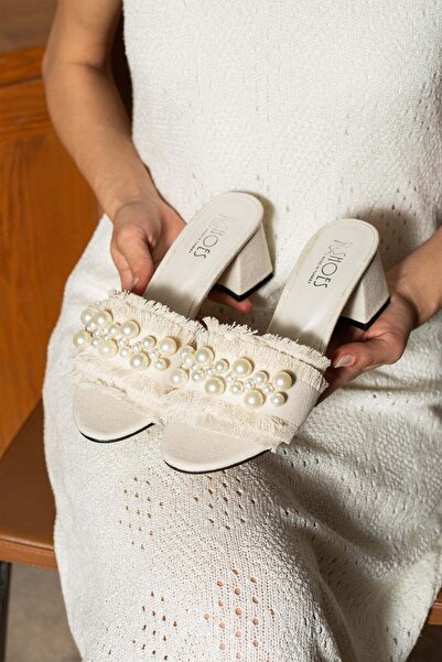 dabab shoes صندل نسائي من NUBIA بكعب من القش ومزين باللؤلؤ باللون البيج