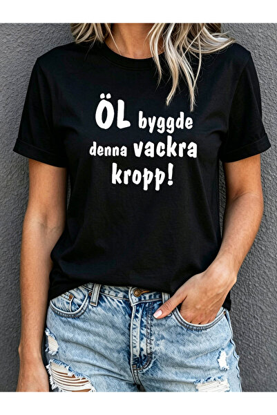 NOURAM تي شيرت نسائي بطبعة مضحكة بعبارة "Built Swedish Beer" وياقة دائرية، بل...