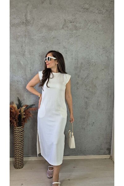 Butik YIRTMAÇ DETAYLI MİDİ MODAL KUMAŞ ELBİSE