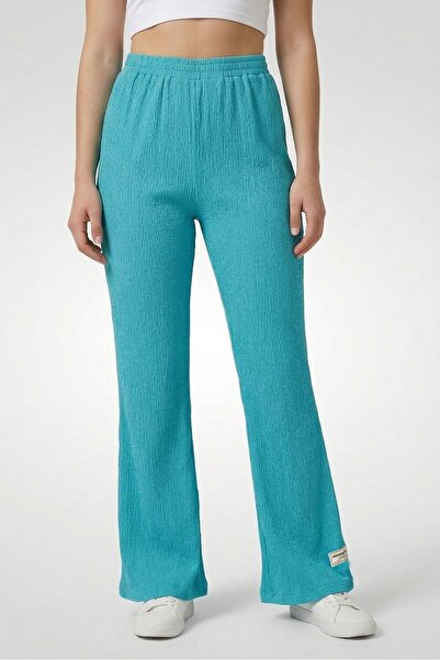 The Giving Movement Women Regular Fit Textured Flared Pants, Turquoise