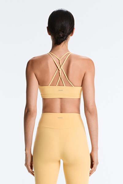 Oysho Comfortlux çapraz askılı hafif destekli spor sütyeni