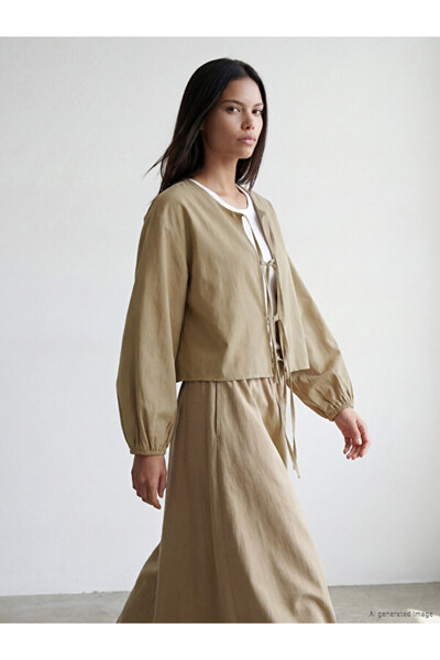 LC Waikiki Rmz Gi̇yi̇m Farkiyla Tied Roba Collar Balloon Sleeve Blouse