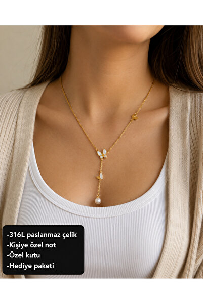 HER ŞEY NOTA www.herseynota.com Elovira Butterfly Detailed Pearl Dangle Women...