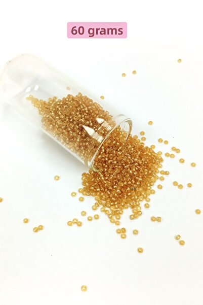 Generic Brand Cast glass sand beads (11/0) 2 mm - 60 grams - transparent gold...