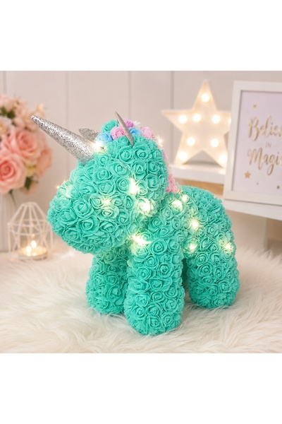 velve Unicorn floral turcoaz din trandafiri de spuma cu LED-uri, in cutie tra...