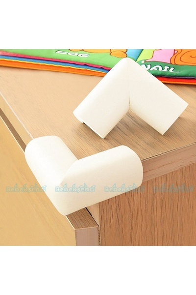 Evokids Protector de colț din cauciuc 4 bucăți (crem)