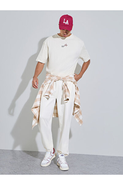 Styli Cream Solid Elasticated Hem Relaxed Fit Joggers