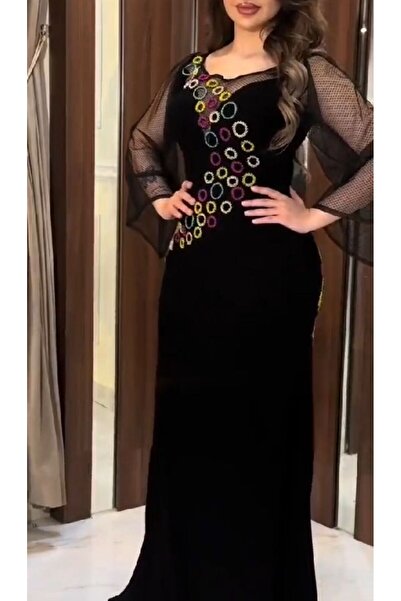 NALA FASHION فستان سهرة أسود طويل بتصميم يجمع بين الفخامة والجرأة،