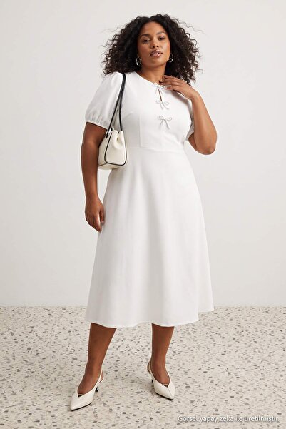 Trendyol Curve Ecru Finike gewebtes Kleid in Übergröße TBBSS25AH00224