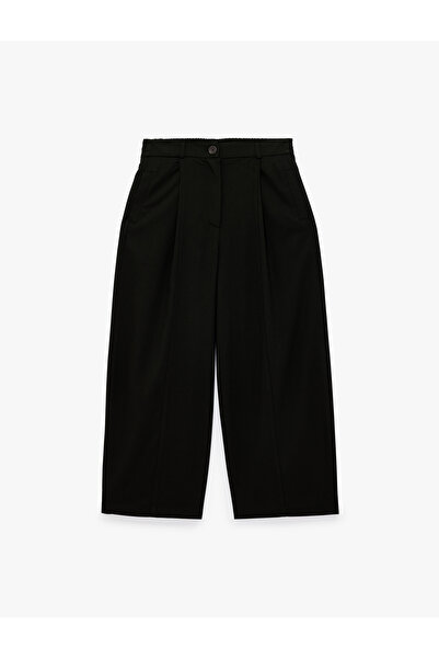 Koton Comfortable Fit Pleated Pocketed Balloon Cut Fabric Trousers