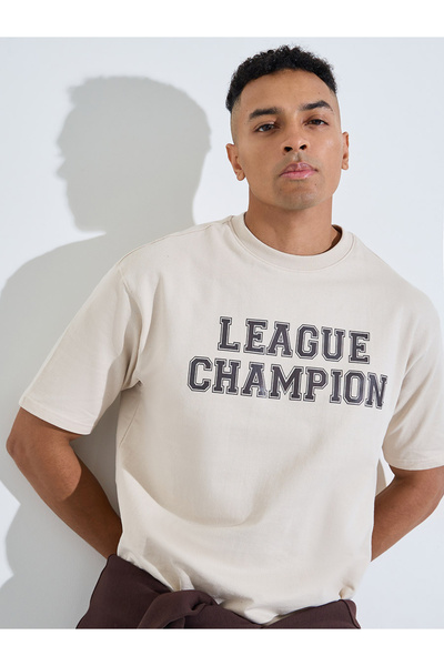 Styli Beige Slogan Print Crew Neck Oversized T-Shirt
