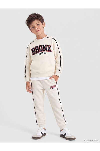 LC Waikiki Lcw Kids Ecru Printed Boys' Jogger Sweatpants