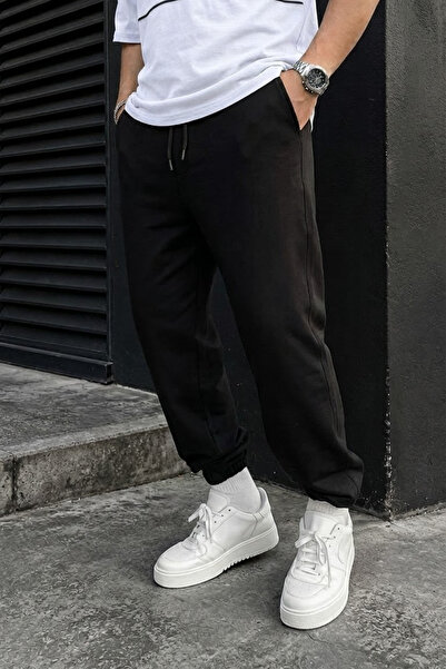 INFLUYENTE Men's Winter Knitted Sweatpants with Fleece Lining and Elastic Cuffs
