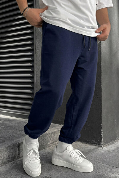 INFLUYENTE Men's Winter Knitted Sweatpants with Fleece Lining and Elastic Cuffs
