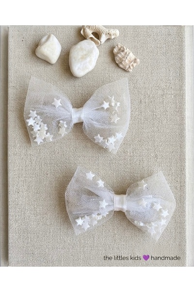 the Littles Kids 2 Pieces of Ribbon Clips with Pompoms, Pearls, and Flowers
