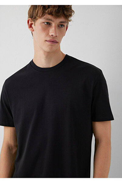 Mavi Schwarzes Basic-T-Shirt mit Etikettendetail, lockere Passform 0611824 -900