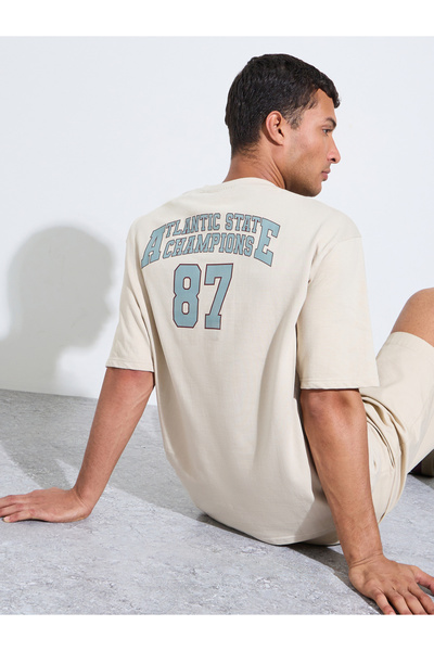 Styli Beige Graphic Print Crew Neck Oversized T-Shirt