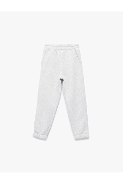 Koton Kids Pantaloni de trening basic pentru fete, cu detaliu tip buzunar