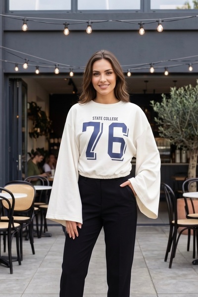 gozdefashion بلوزة نسائية 76 بأكمام على شكل خفاش وتفاصيل مطبوعة
