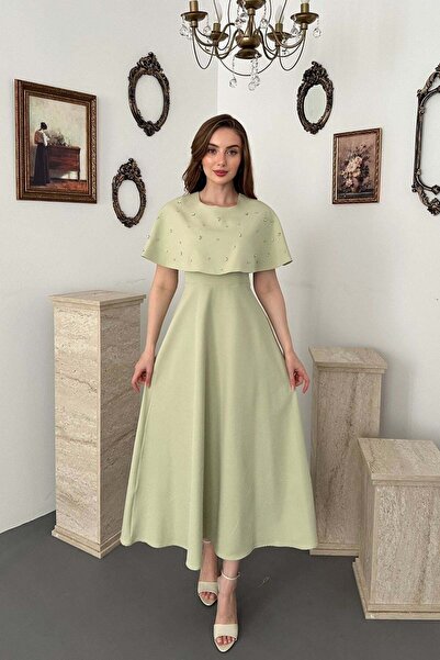 Elbee Fashion Woman Woman's green stone detailed cape dress