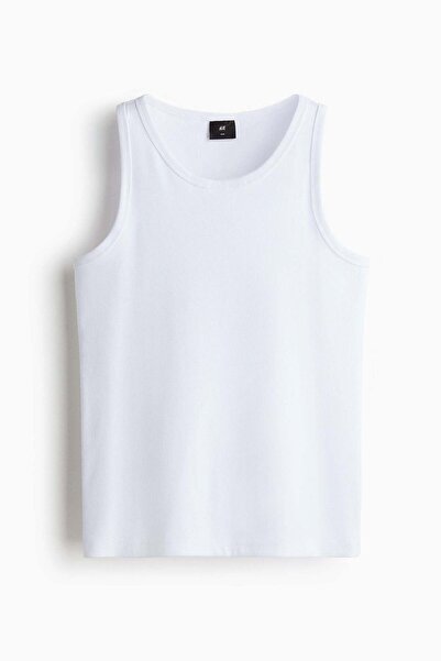 H&M قميص صدرية مضلعة بقصّة Slim Fit
