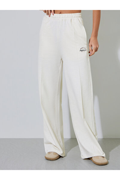 Styli Cream Slogan Print Wide Leg Knitted Joggers with Pintuck Details