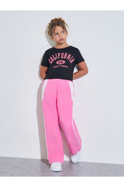 Styli Teen Girls Black Graphic Print T-Shirt and Pink Side Striped Joggers Set
