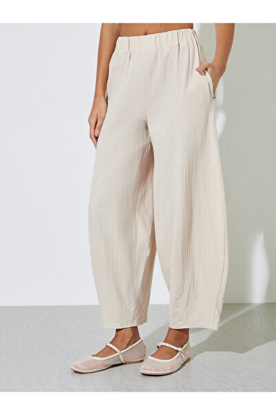 Styli Beige Textured Wide Leg Pleated Tapered Pants