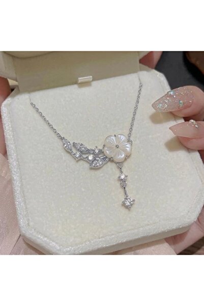 Heda Jewelry قلادة حديقة الزهور - قلادة أنيقة من الفولاذ بتفاصيل زهرية