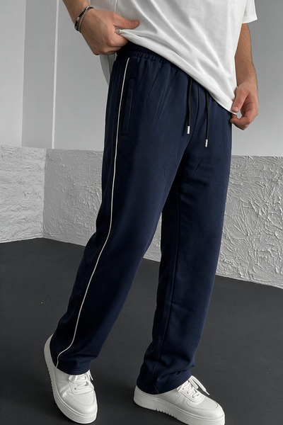 INFLUYENTE Men's Fleece-Lined Sweatpants with Zipper Pockets and Elastic Wais...