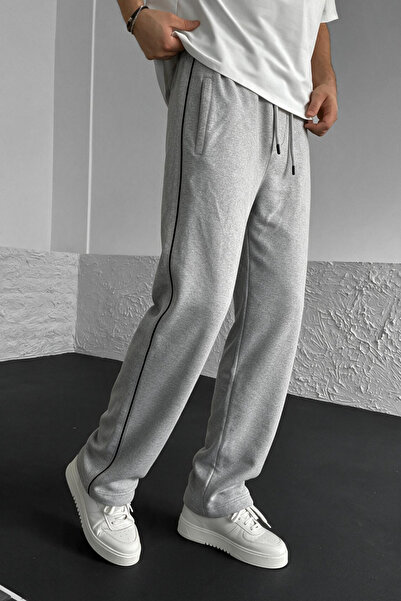 INFLUYENTE Men's Fleece-Lined Sweatpants with Zipper Pockets and Elastic Wais...