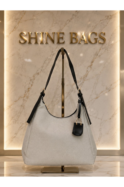 BAGS حقيبة كتف نسائية من القماش البيج المزخرف باللون الأسود والبني مع حزام قا...