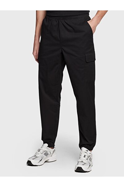 New Balance PANTALONI BĂRBAȚI MP13501-BK