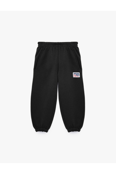 Koton Pocket Detailed Three-Thread Raster Label Printed Jogger Sweatpants wit...