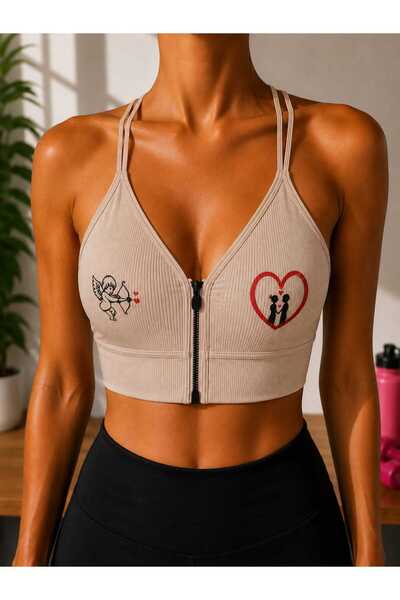 Novera Ribbed Patterned Zippered Sports Bra with Removable Pads