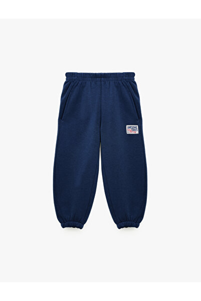 Koton Pocket Detailed Three-Thread Raster Label Printed Jogger Sweatpants wit...