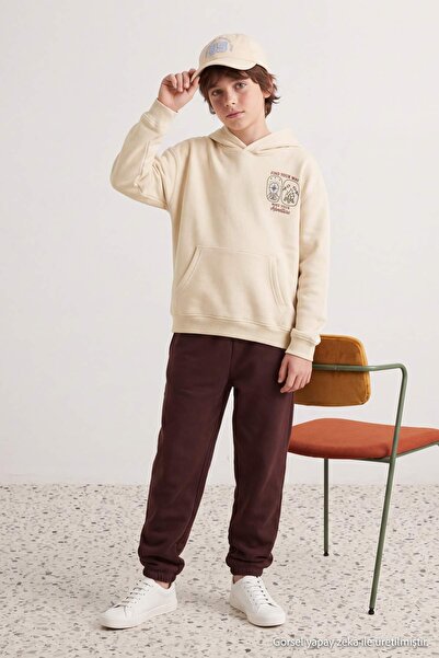 TRENDYOLKIDS Braunes Slogan-Strick-Set (Oberteil und Unterteil) TKDAW26AU00035