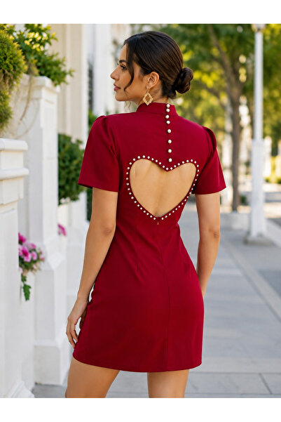 Kokosh moda Bezvremenska elegancija - Ženska mini haljina od krepa sa detalji...