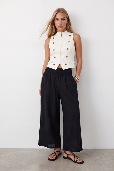 Trend Alaçatı Stili Women's black high-waisted trousers with lace-up detail a...