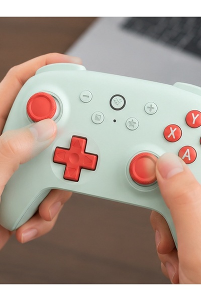 8Bitdo وحدة تحكم لاسلكية Ultimate 2C لأجهزة الكمبيوتر التي تعمل بنظام Windows والأندرويد، بمعدل استجابة 1000 هرتز، وعصا تحكم ومستشعرات Hall Effect